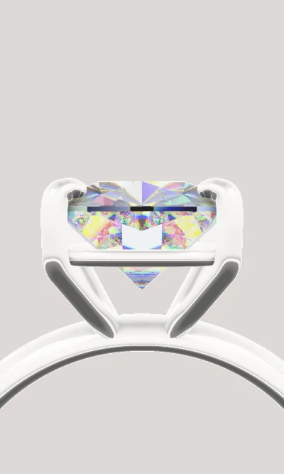 A cushion-cut solitaire rendered in 3D by Refracte, fire breaking across the pavilion